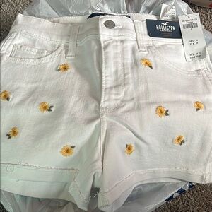 Hollister White and Yellow Jean Shorts with Sunflower Embroidery